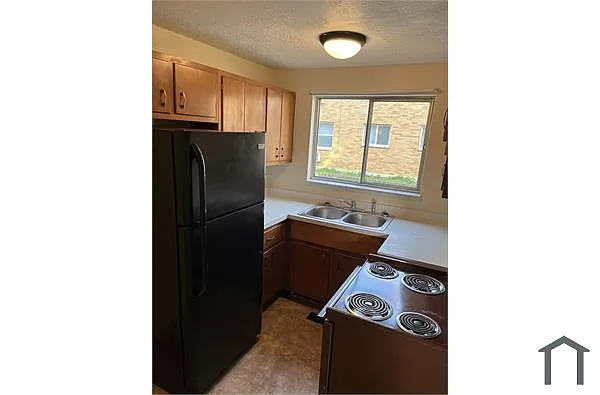 Building Photo - 1430 N James H McGee Blvd #8