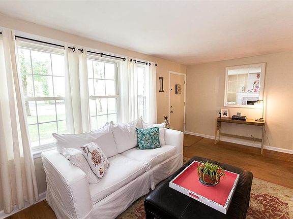 Large updated tilt in vinyl windows throughout the main level.