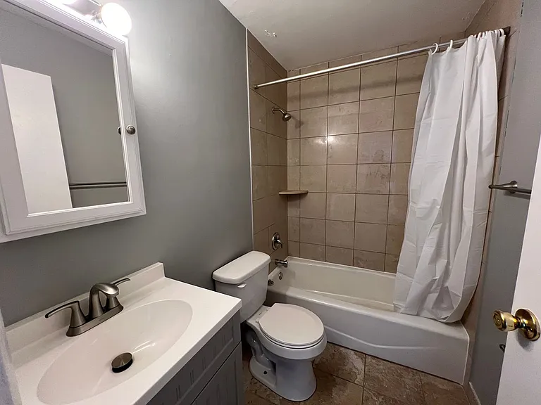 Village Apartments — Photo 13