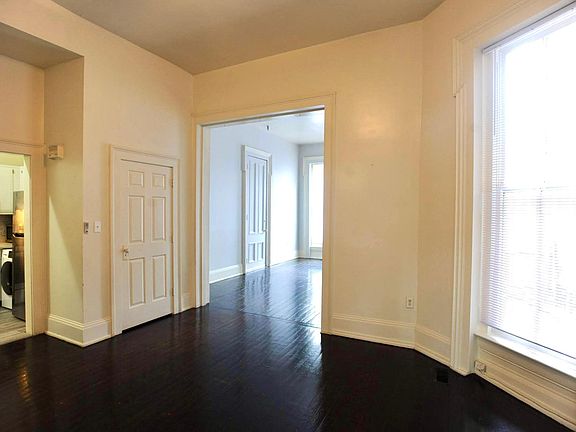 Dining room looking into the living room and kitchen