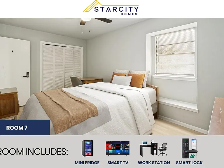 Furnished bedroom with a full bed, work desk, and closet storage, plus a window and ceiling fan for comfort.