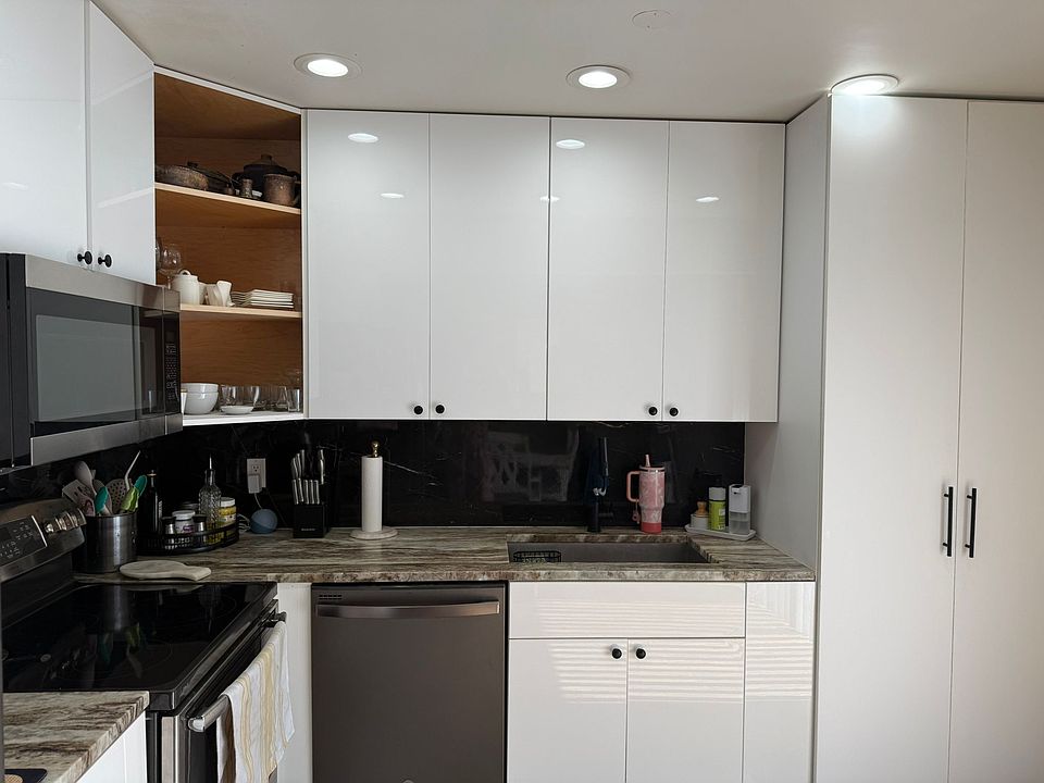 Stainless steel appliances and soft-close European cabinets