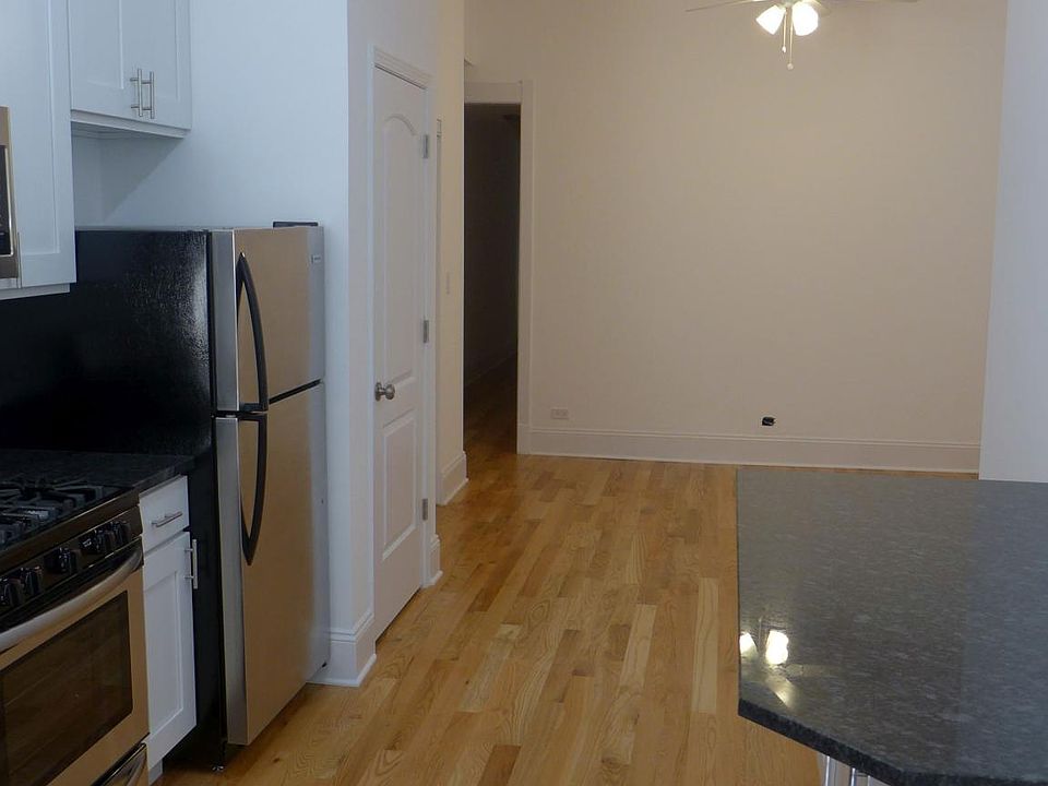 #1155-4: Kitchen/ Dining Area Side View