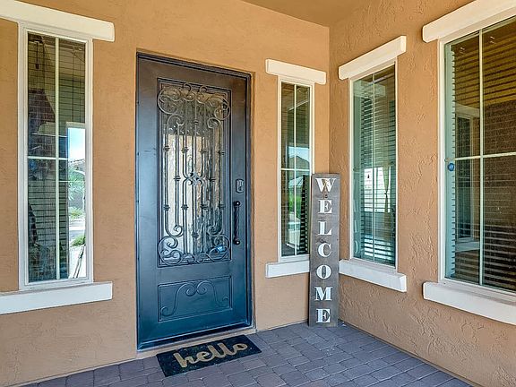 Iron front door, large covered entry