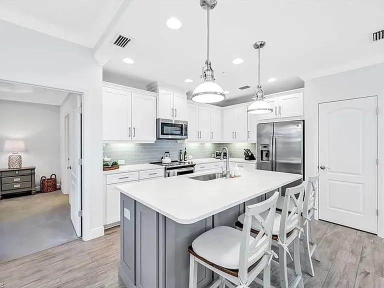 Eat up kitchen with three bar stools