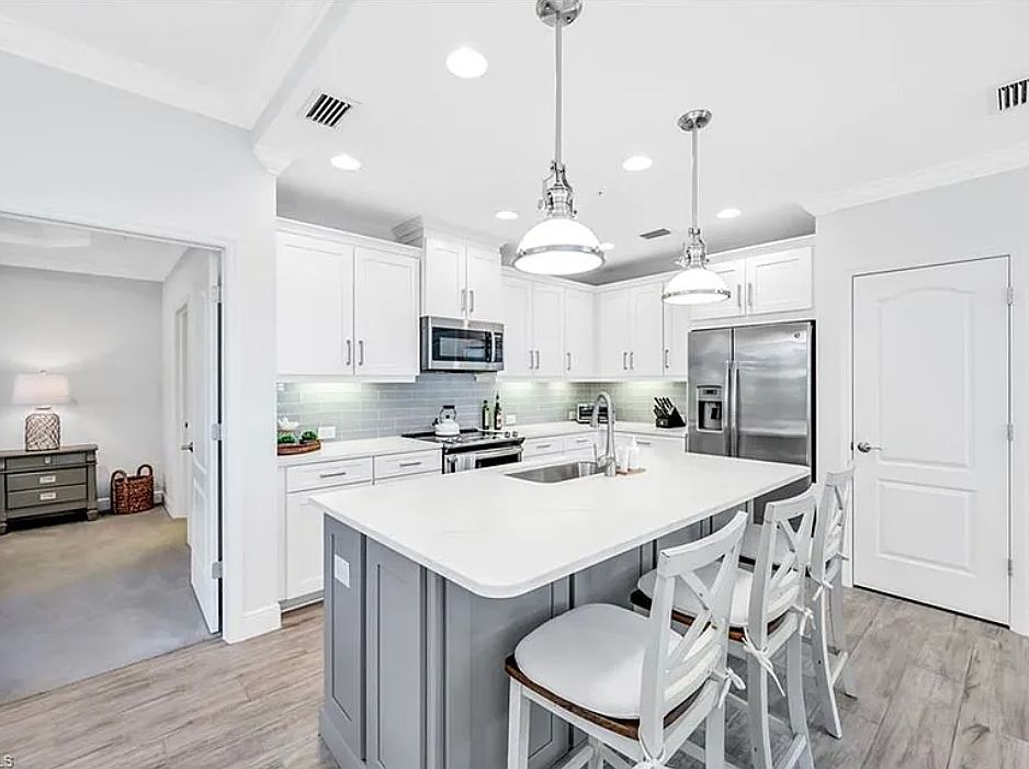 Eat up kitchen with three bar stools