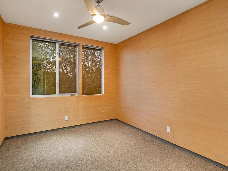 bedroom view looking onto fruit trees