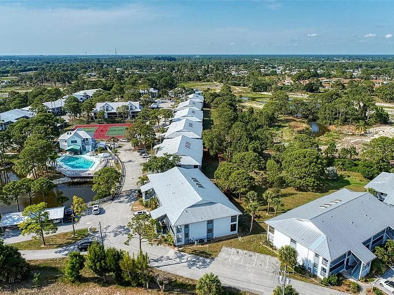 Seeing is believing. __ Get a feel for the layout of your next vacation! This aerial view highlights the beautiful landscaping, the proximity to the preserve, and the quiet, safe community atmosphere that makes Unit 1003 so special.