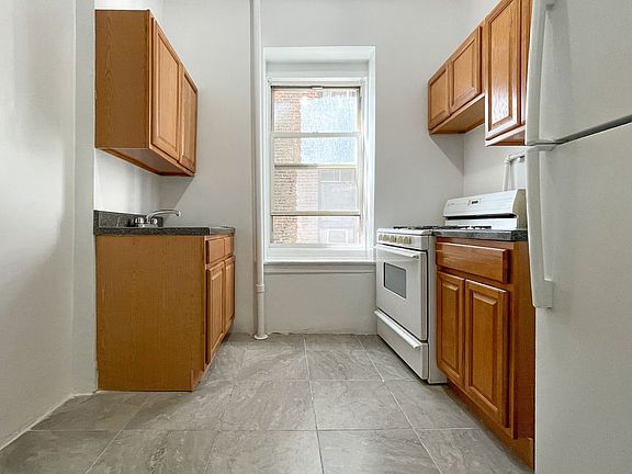 5th image of 228 8th Ave APT 3