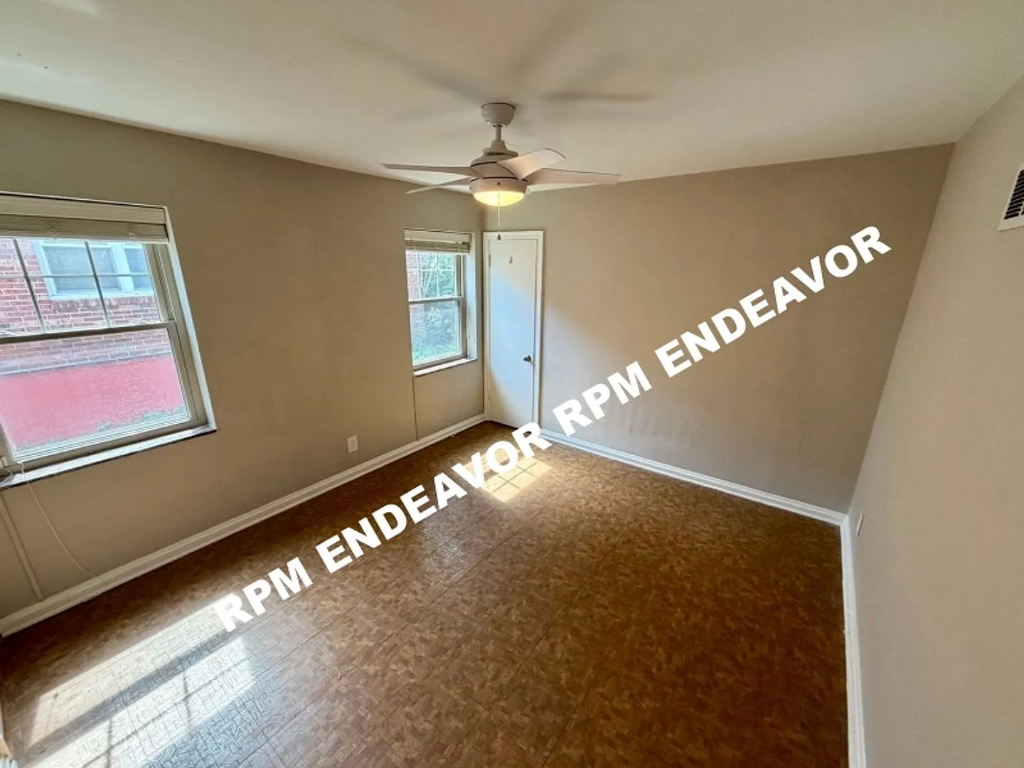 Spacious U-City Home with Finished Lower Level & 2 Car Garage — Photo 4