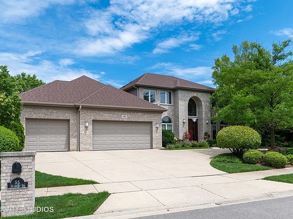 Large 3 car garage takes you into the mud room
