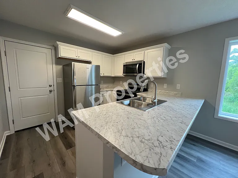 5132 NW Torgerson Dr — Photo 4