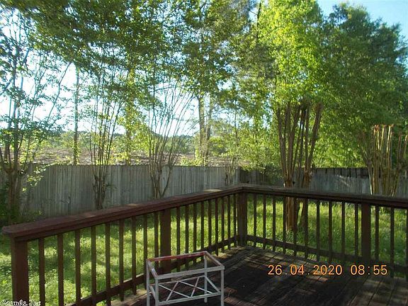 Crepe Myrtles line the fence