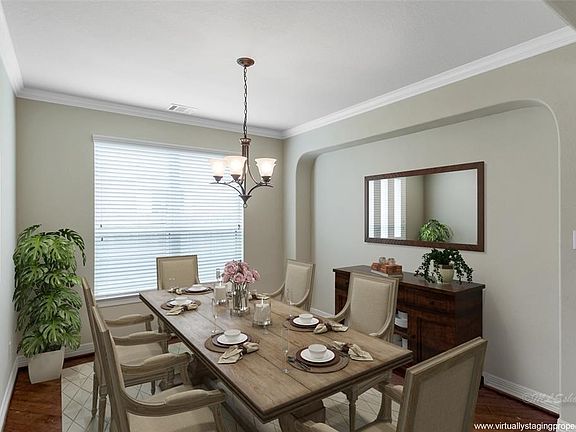 Lovely dining room space - this photo has been digitally staged to show possible furniture placement