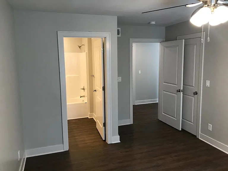 2nd floor bathroom with walk in closet behind door to right