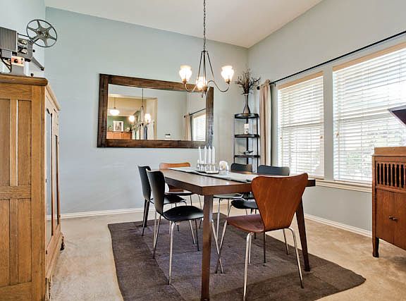 Formal dining easily accommodates large furniture groupings.