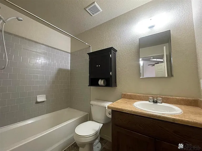 9027 E 31st Ln — Photo 16