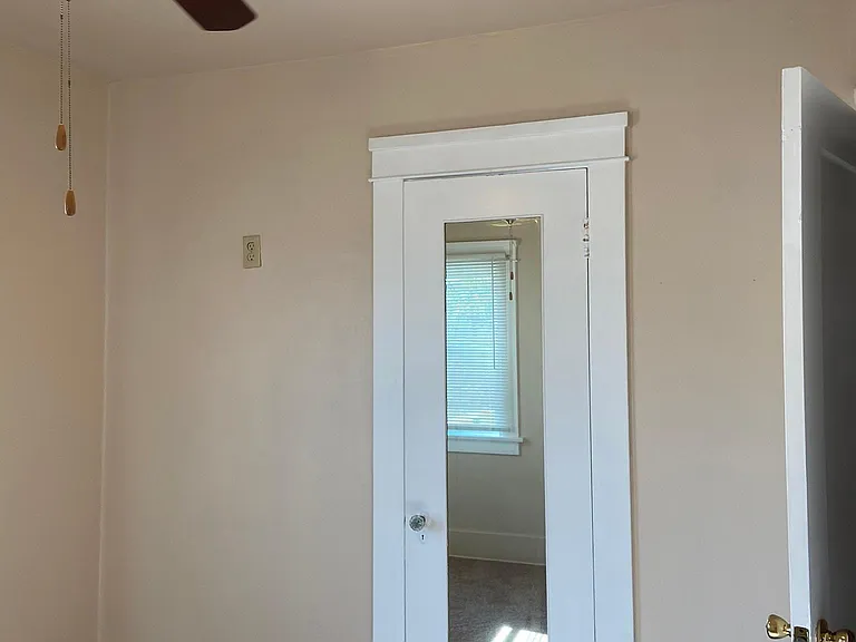 Bedroom with walk in closet