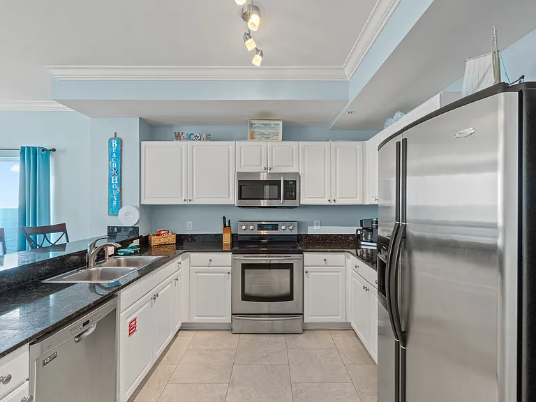For times you do not feel like eating out, the kitchen provides all you basic kitchen appliances, kitchenware, dinnerware, and utensils.
