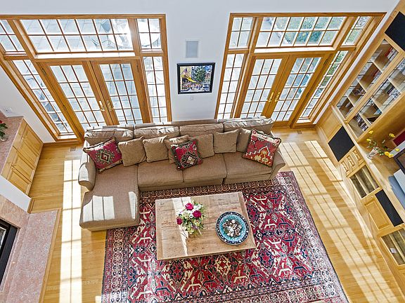 Family Room with Two Tiers Palladian Windows