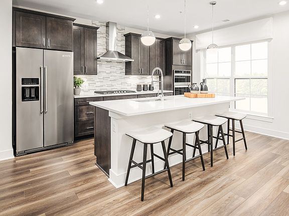 Open Floor Plan Centered Around the Kitchen