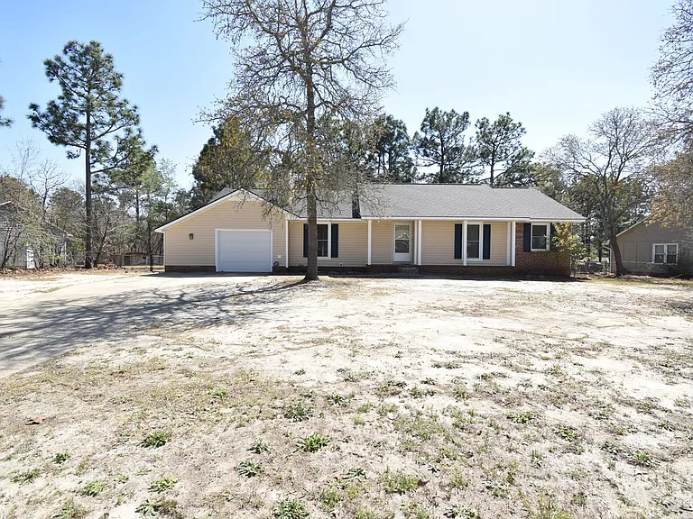6901 Woodmark Dr — Photo 2