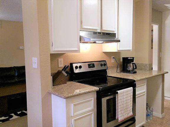 Kitchen with granite countertop