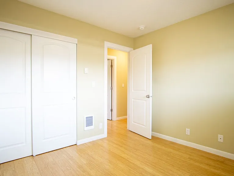 Get 1 Month FREE! Top-Floor 2-Bedroom with Bamboo Flooring + Off-Street Parking! — Photo 15