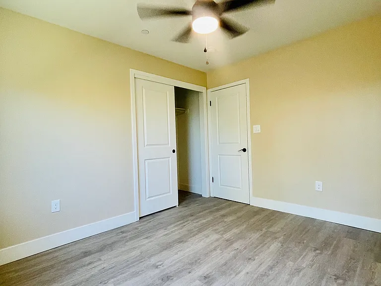 207 E 3rd St — Photo 12