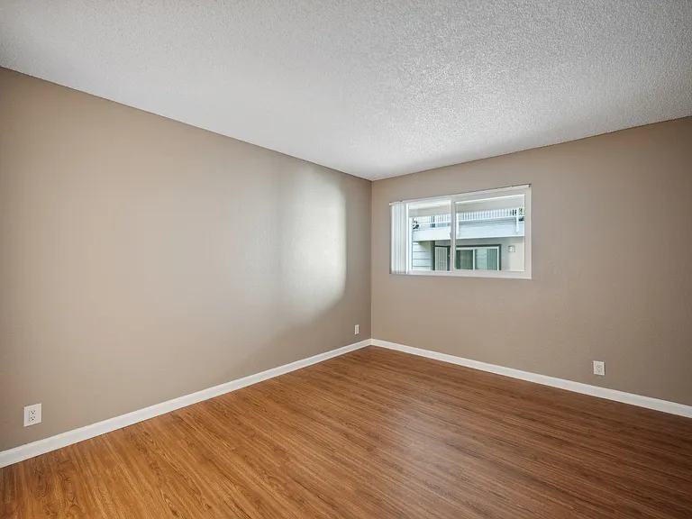 Our Premium Guest Bedroom in a Two Bedroom Two Bath Apartment at Meadow Creek Apartments in San Marcos, CA