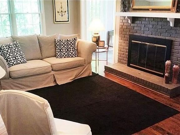 Fire-side Family room opens into Sunroom
