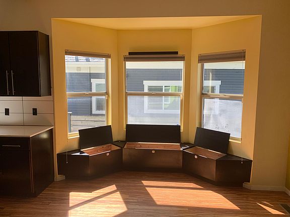 Big bay windows with built-in cedar box storage