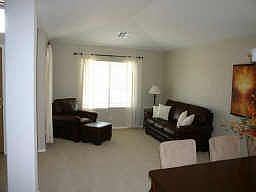 Formal Living Room w/ V-Ceilings. Upgraded Carpet & Pad. Note open&bright T/O 