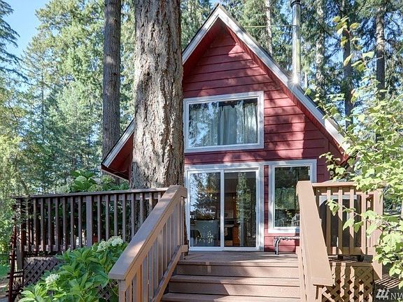 Wood deck at front of the home with two sets of stairs. New windows and home has been updated!!!