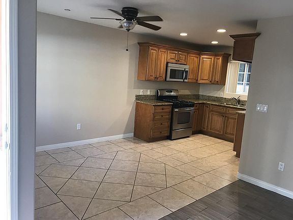 Dining room to the left, kitchen on the right.