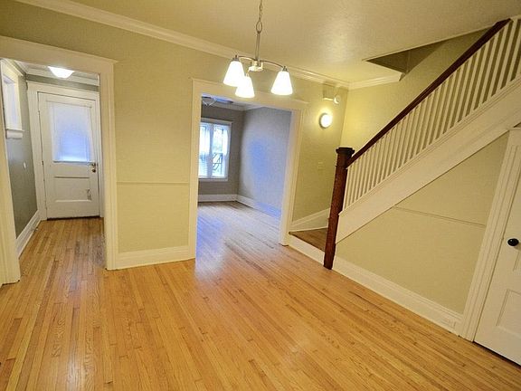 Dining looking to living room and foyer.