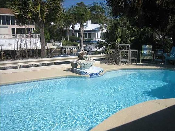 The pool overlooks the canal