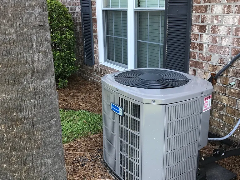 outside HVAC unit outside bathroom window