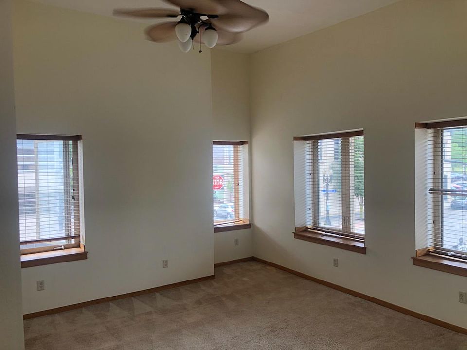 Living room. The apartment has been newly painted and boasts window seats overlooking the Grand River:)