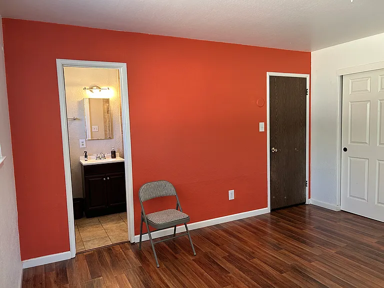 Studio bathroom through left door.