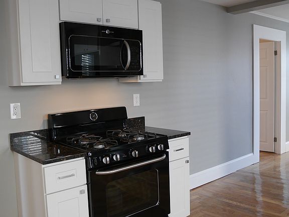 GE Artistry built-in microwave provides cooking ventilation