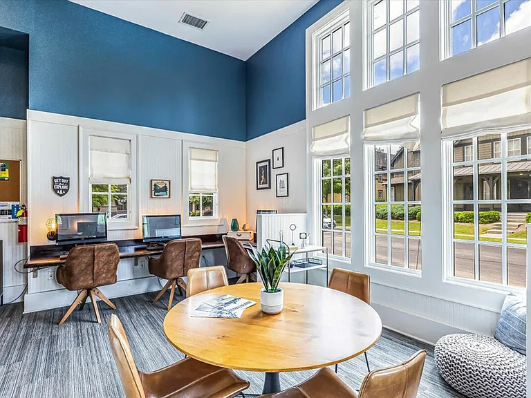 Study and collaborate in the cozy community workspace at The Cottages of Hattiesburg.