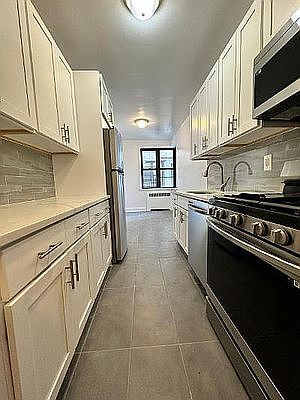 4th image of 118-11 84th Ave Unit 618