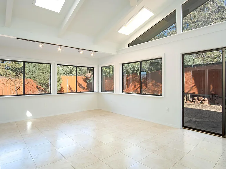 Windows to the backyard from the flex space