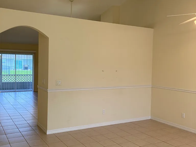 Living area with decorative shelf space