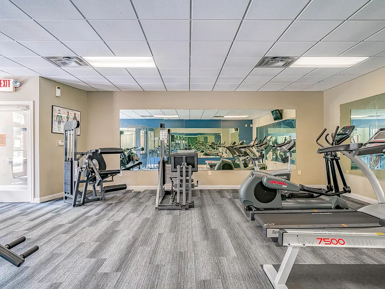 Stay active in our 24-hour fitness center, featuring a variety of workout equipment.