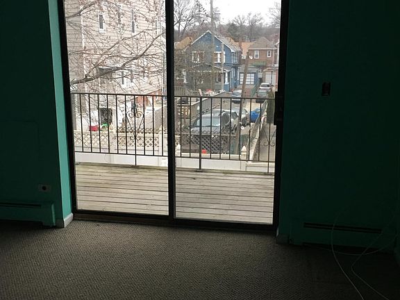 Master bedroom with deck/balcony