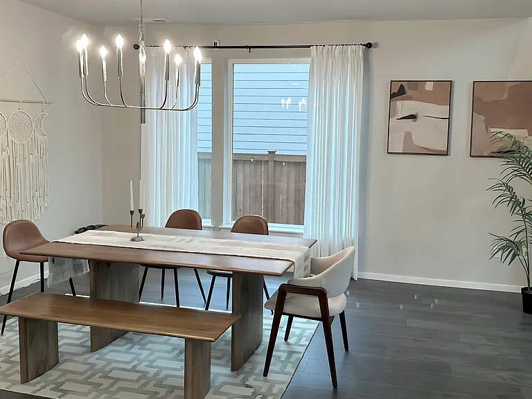Dining area next to kitchen/living.