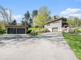 821 Grand River Dr NE, Ada, MI 49301