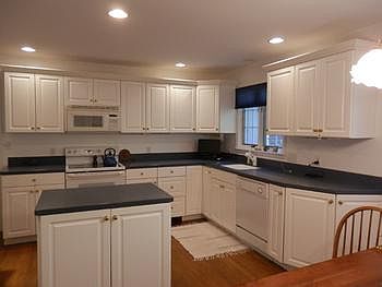 Gorgeous white kitchen plus solid surface countertops